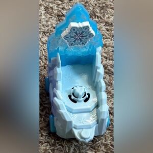 a Fisher-Price Little People Disney Frozen Elsa Parade Float.